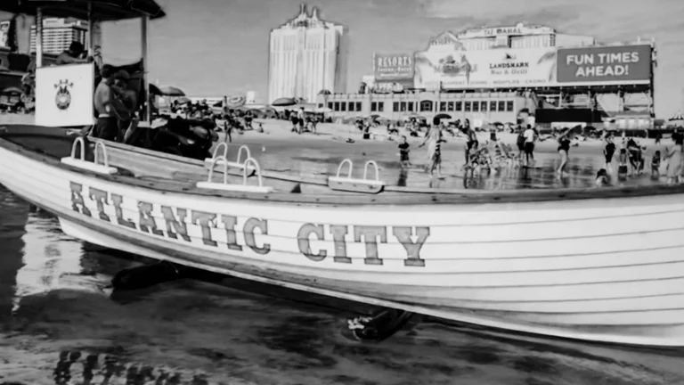 Boat on the shore with Atlantic City written on it as its gaming revenue hits record