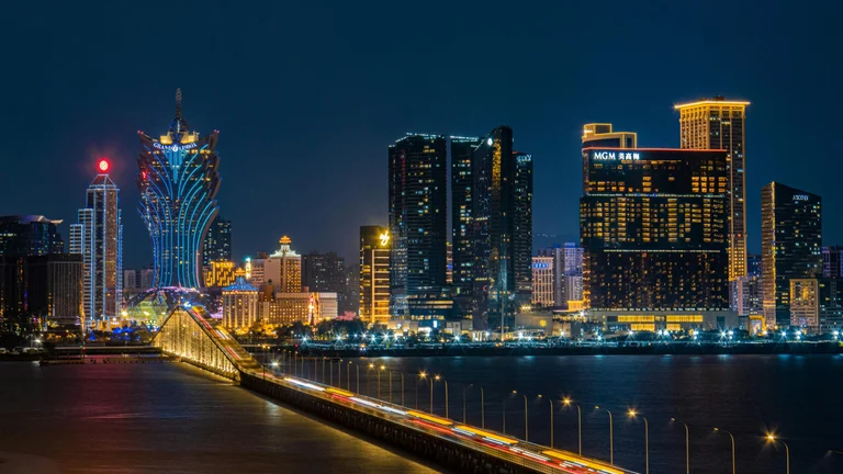 Macau at night, with Landmark Casino closure being the final satellite casino closure