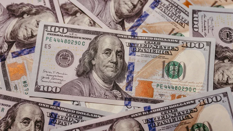 Several hundreds of dollar bills as EDC invests in lobbying