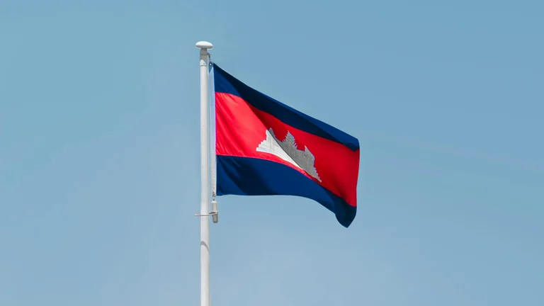 Cambodia flag flies in the sky, casino regulatory compliance in Cambodia raises revenue