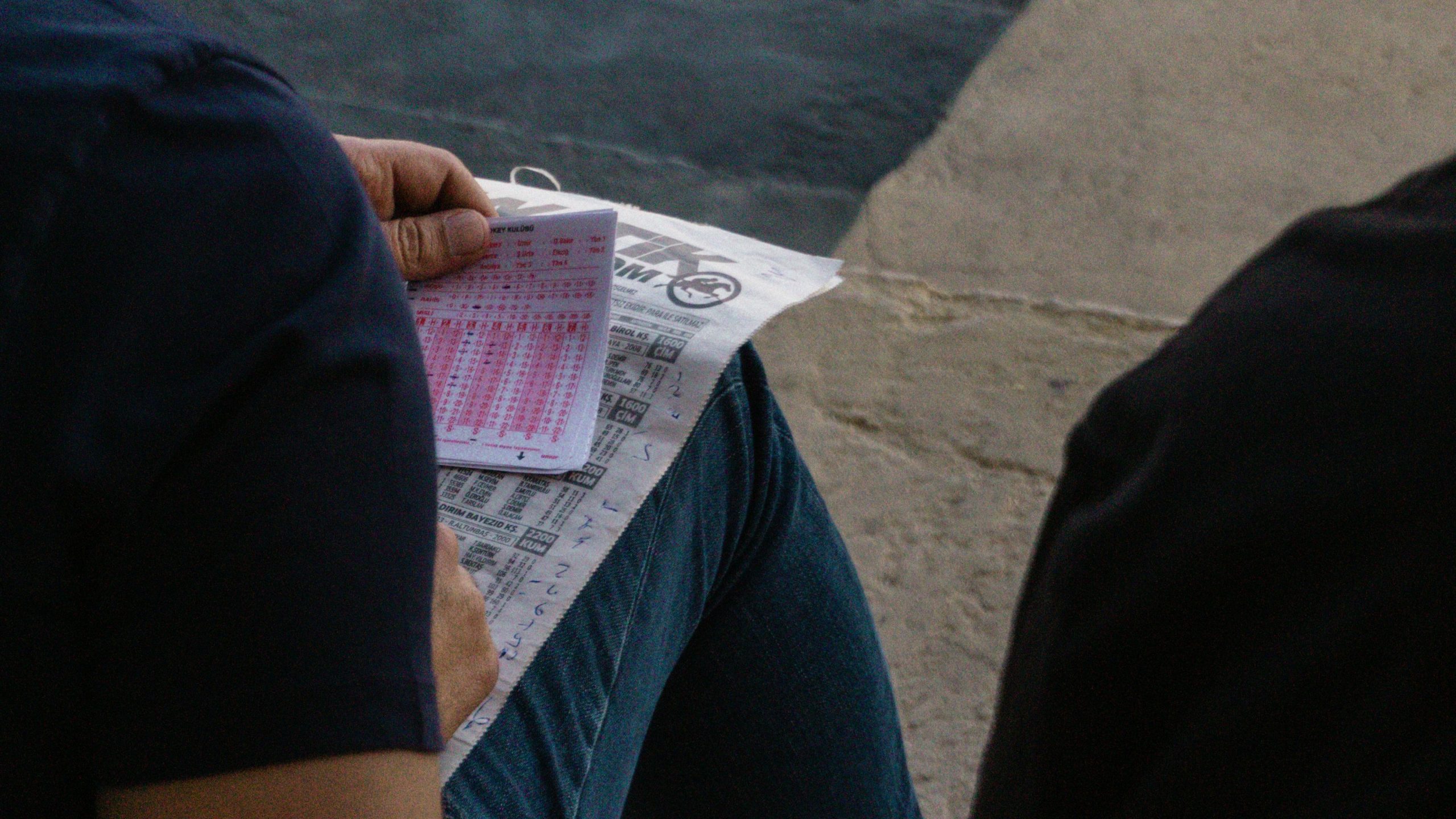 Male placing a live sports betting as the tax reform comes in